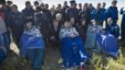 Canadian Chris Hadfield, Russian Roman Romanenko, and American Tom Marshburn rest after leaving the Russian Soyuz space capsule following its landing in Kazakhstan on May 15.