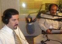 Kamiar and Arash Alaei being interviewed in Washington (RFE/RL)