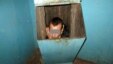 This Russian man had to be rescued from a trash chute after trying to escape his girlfriend.