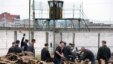 Just another day at the mill? Inmates chop wood at Belarus