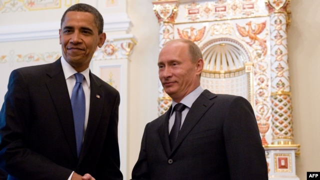 Freedom House has urged U.S. President Barack Obama (left) to 'think twice' before traveling to Russia to meet President Vladimir Putin before September's G20 summit.