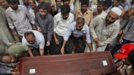 Shahzad's burial in Karachi, June 1