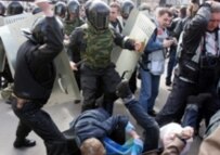 Police clash with protesters in St. Petersburg today (AFP)