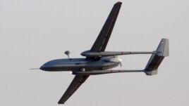 A Hermes 500 UAV flies over the Hatzerim air force base in southern Israel's Negev desert in 2011.