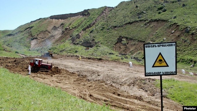 Armenia -- A warning sign at  a toxic waste burial site near Yerevan.