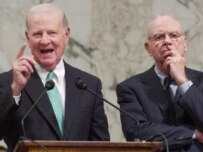 Iraq Study Group co-chairs James A. Baker (left) and Lee Hamilton answer questions at a news conference about their report in Washington today (epa)
