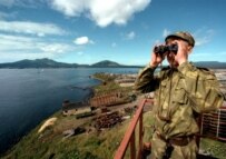 A Russian soldier on the lookout in the Kuriles (ITAR TASS)