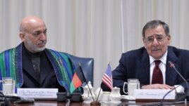 U.S. Defense Secretary Leon Panetta (right) with Afghan President Hamid Karzai during their meeting at the Pentagon.