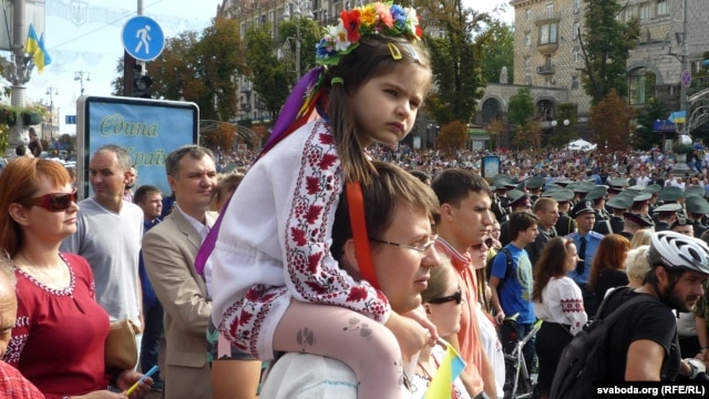 A young attendee watches Ukraine's Independence Day parade in Kyiv on August 24. 