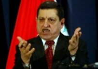 Election official Farid Ayar announcing the referendum results on 25 October (AFP)