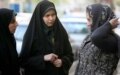Police and Basij activists check women for proper dress in Tehran on April 22 (Fars)