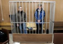 Mikhail Khodorkovsky (left) and Platon Lebedev on trial in 2005 (AFP)