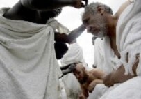 Men shave their heads at the end of the hajj to symbolize rebirth (AFP)