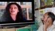 An Afghan man watches an Indian soap opera at his TV shop in Kabul. The Afghan culture minister said that female newsreaders should appear different from actresses in movies and soap operas.