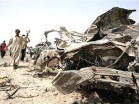The rush-hour car bobm killed at least 25 people in the Bayaa district of Baghdad (AFP)