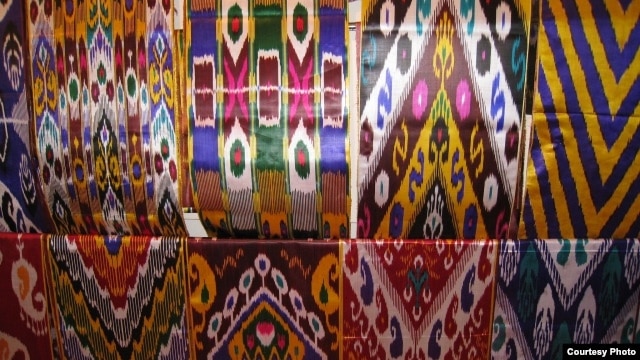The vividly colored and intricately patterned silk fabric known to Uzbeks as "atlas" is an essential part of the national costume.