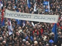 Serbian Radical Party supporters hold a banner reading: 'Russia Help Us!' (AFP)