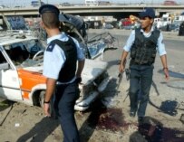 Iraqi police at the site of August bombing in Baghdad (epa)