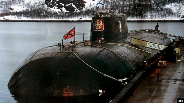 An undated photo of the ill-fated Kursk submarine at her mooring at a base of Vidyayevo, Russia.