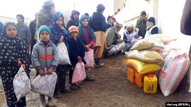Winter aid is distributed to needy families in Herat Province on January 9.