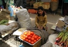Tajikistan -- a girl in Dushanbe market