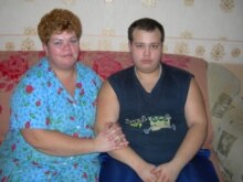 Russia – Oleg Nanochkin with his mother Svetlana in their home in Moscow, Feb2008