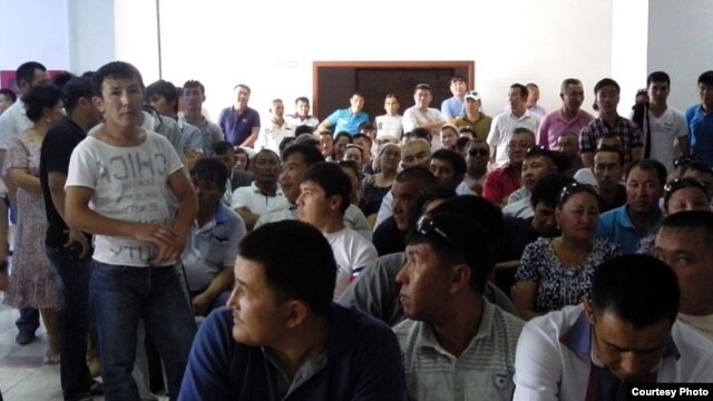Kazakhs at a courthouse in Aqtau await verdicts in a case concerning riots in the town of Shetpe late last year. 