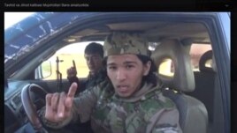 Узбекский боевик, обещающий вернуться на родину.