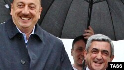 Azerbaijani President Ilham Aliyev (left) and Armenian President Serzh Sarkisian in happier times (file photo)
