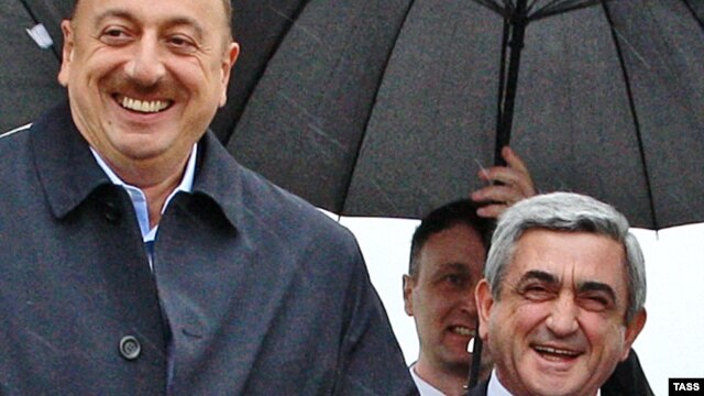 Azerbaijani President Ilham Aliyev (left) and Armenian President Serzh Sarkisian in happier times (file photo)