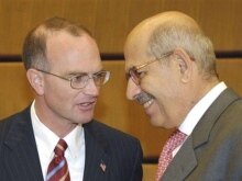 Austria -- IAEA Director-General Muhammad el-Baradei (R) talks with US ambassador Gregory Schulte at IAEA headquarters in Vienna, 10Sep2007
