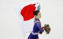 Shizuka Arakawa after her victory in the women's singles figure skating (epa)
