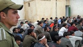 Afghan refugees being deported from Iran in 2007