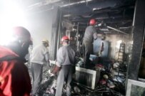 Emergency response team at the site of one of the 24 January bombings (epa)