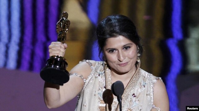 Pakistani filmmaker Sharmeen Obaid Chinoy accepts the Oscar for the Best Documentary Short Subject for their film "Saving Face" at the 84th Academy Awards in Hollywood on February 26.