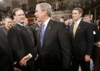 Bush shakes hands with Supreme Court nominee Samuel Alito after delivering his speech (epa)