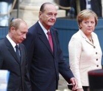 Putin (left), Chirac (center), and Merkel on September 23 (epa)