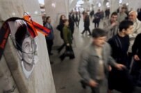 A portrait of Vagan Abramyants hanging in the Moscow metro. Abramyants was murdered at the station on April 24 (epa)