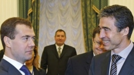 Russian President Dmitry Medvedev (left) meets with NATO Secretary-General Anders Fogh Rasmussen in Moscow in December 2009.