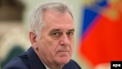 Serbian President Tomislav Nikolic said Russian President Vladimir Putin promised to back Serbia's claim to Kosovo.