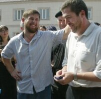 Chechen Prime Minister Ramzan Kadyrov (left) with a rebel who has taken advantage of the amnesty (ITAR-TASS)