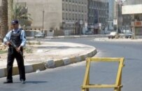 An Iraqi police officer mans a checkpoint on a Baghdad street (file photo) (epa)