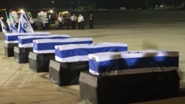 The coffins of the five Israelis who were killed in the attack on a tour bus in Burgas, Bulgaria, arrive at Ben Gurion International Airport near Tel Aviv on July 20.