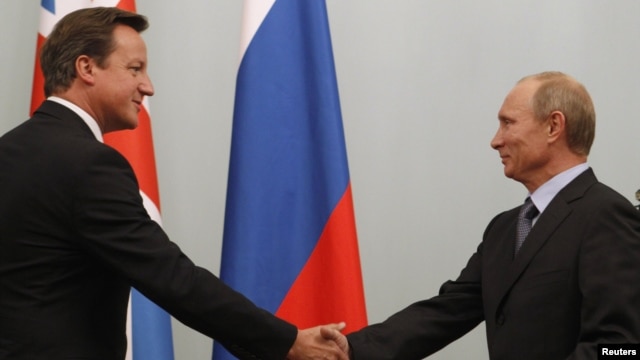 Russian President Vladimir Putin (right) is expected to hold talks with British Prime Minister David Cameron. (file photo)