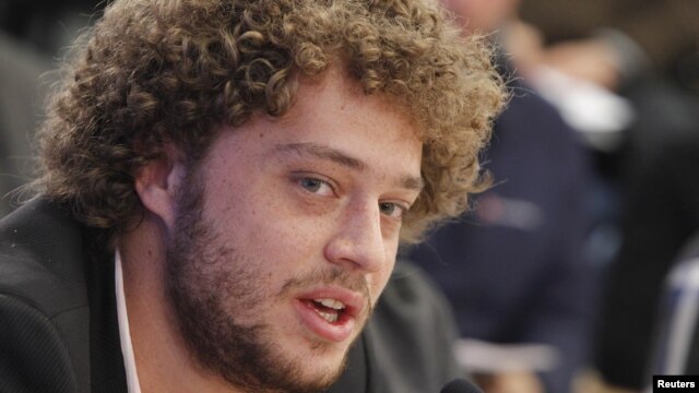 Photo blogger Ilya Varlamov speaks during a news conference by the League of Voters in Moscow on January 18.