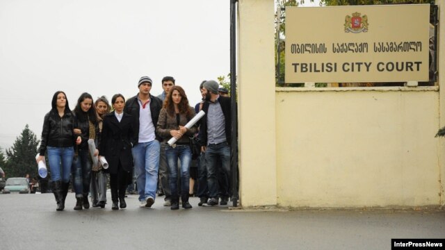 Supporters of former Interior and Defense Minister Bacho Akhalaia arrive at a city court building in Tbilisi on November 9.