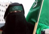 A Hamas supporter at a rally on April 5 (epa)