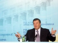Prime Minister Viktor Yanukovych speaking to reporters in Kyiv today (epa)