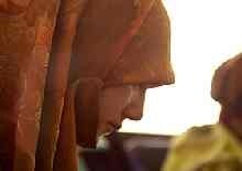 Tajikistan -- woman in headscarf from OSCE website