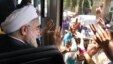 Hassan Rohani greets supporters.